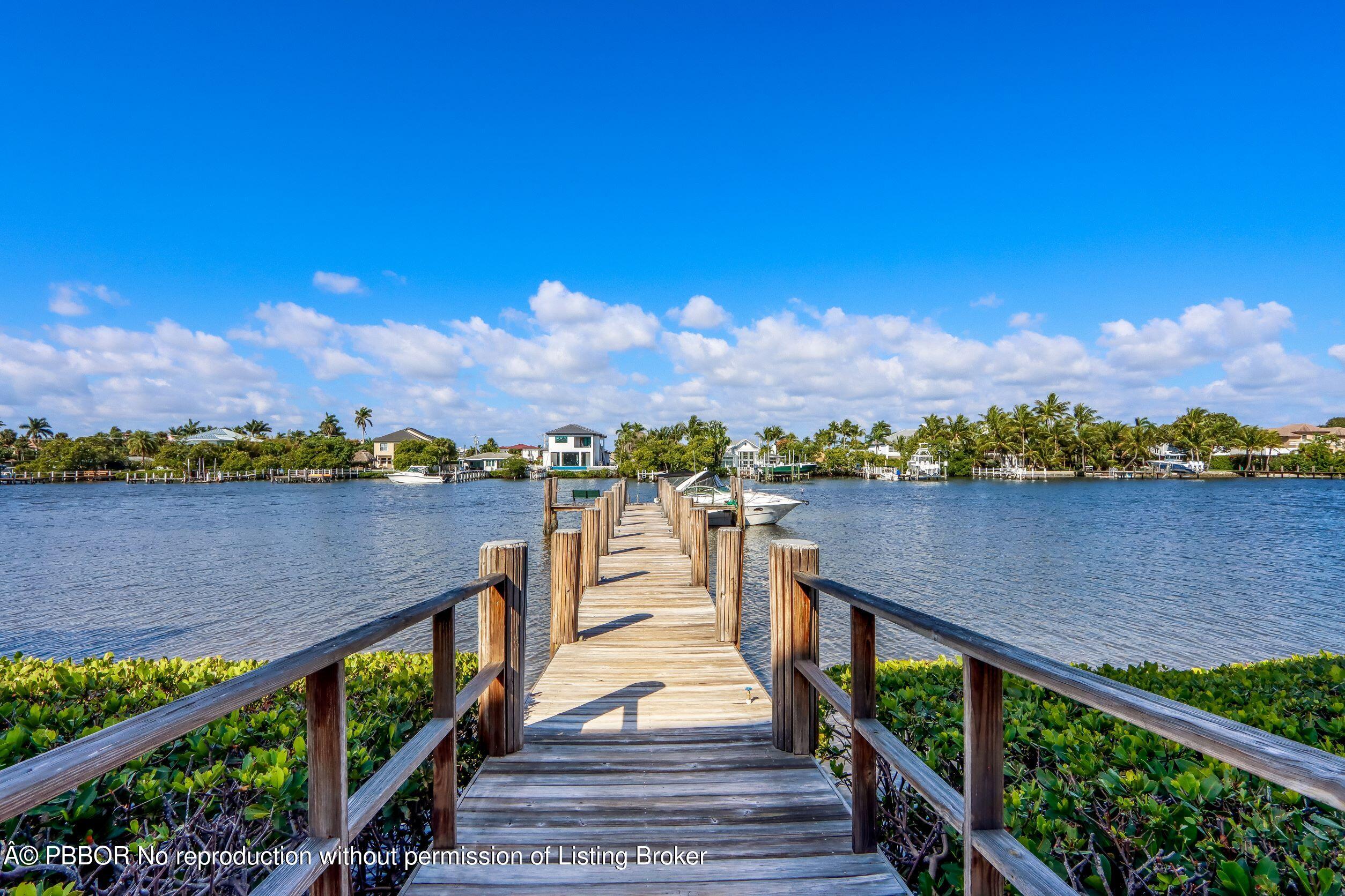 3525 South Ocean Boulevard, Unit 108 Palm Beach, FL 33480 - Photo 1 of 13 a view of city and a lake