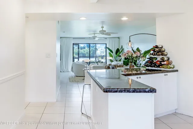 a kitchen with a table and chairs in it