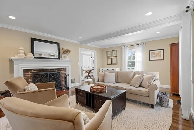 a black and white kitchen with stainless steel appliances granite countertop a stove a sink and a dishwasher