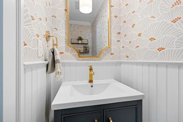 a bathroom with a shower and mirror