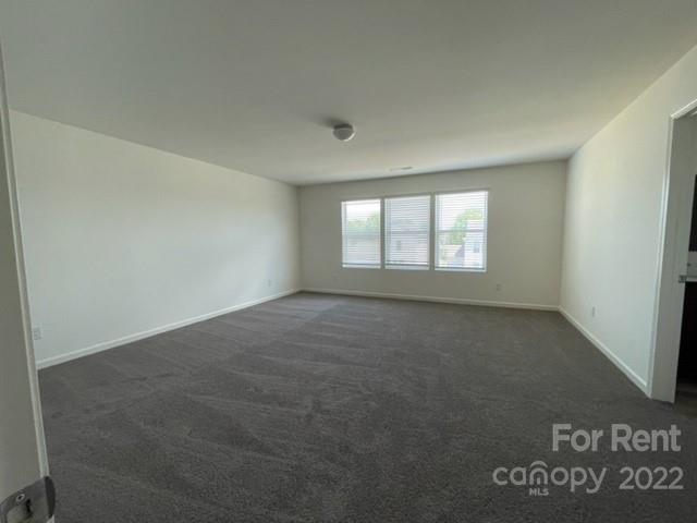 809 Alexander Commons Drive, Unit 34 Monroe, NC 28112 - Photo 17 of 28 an empty room with a window