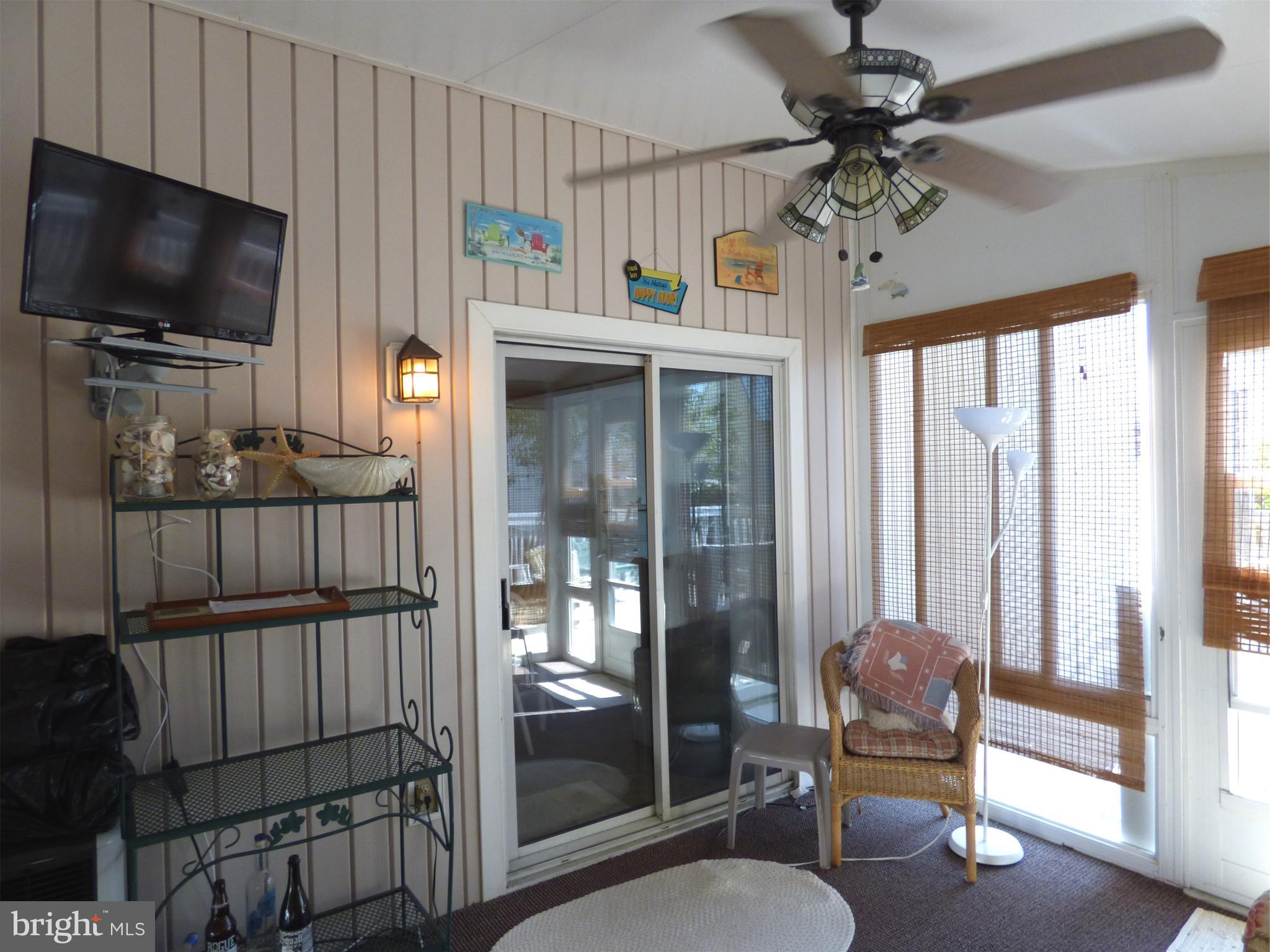 635 Sandy Point Road, Unit 31 Bethany Beach, DE 19930 - Photo 15 of 46 Screened Porch, alternate view