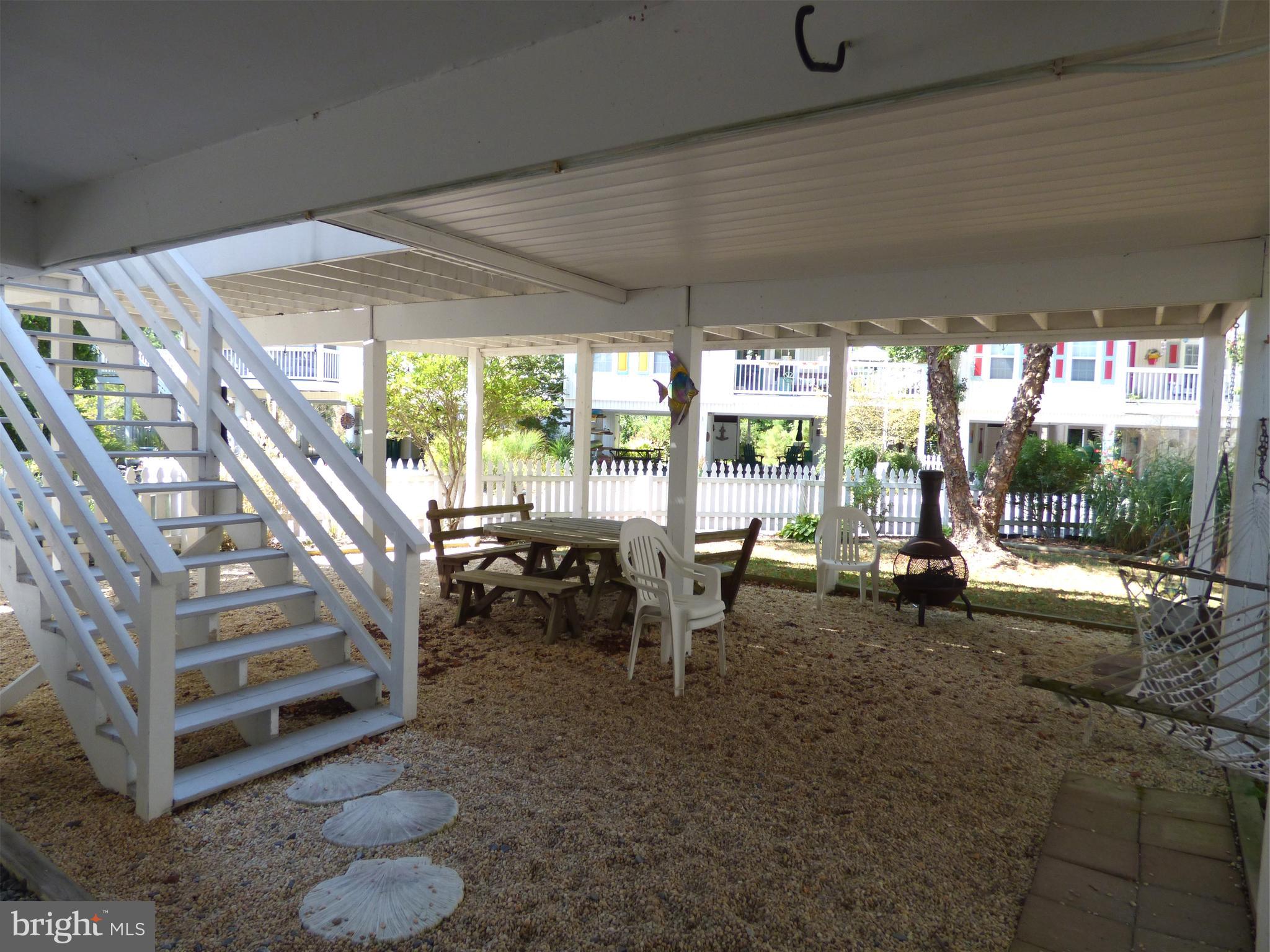 635 Sandy Point Road, Unit 31 Bethany Beach, DE 19930 - Photo 33 of 46 Ground level living outdoor living area