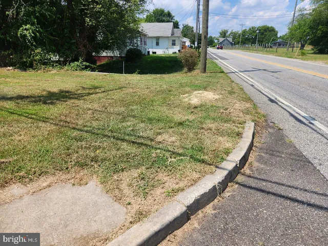a view of a backyard with a garden