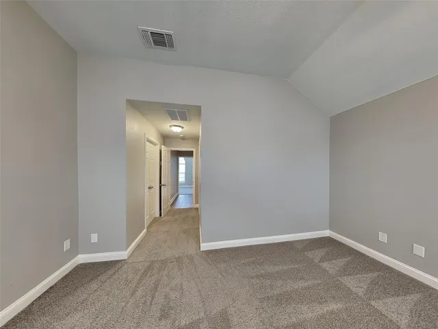 a bathroom with a shower sink and mirror