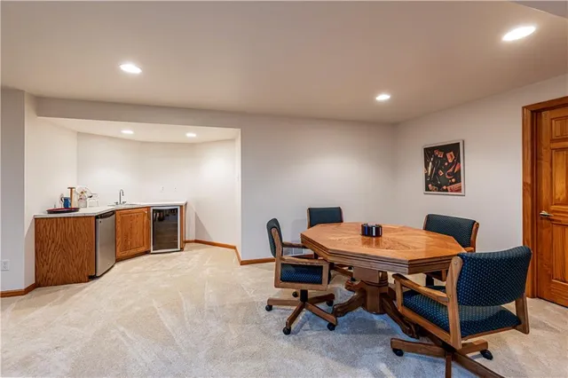 a view of a workspace with furniture