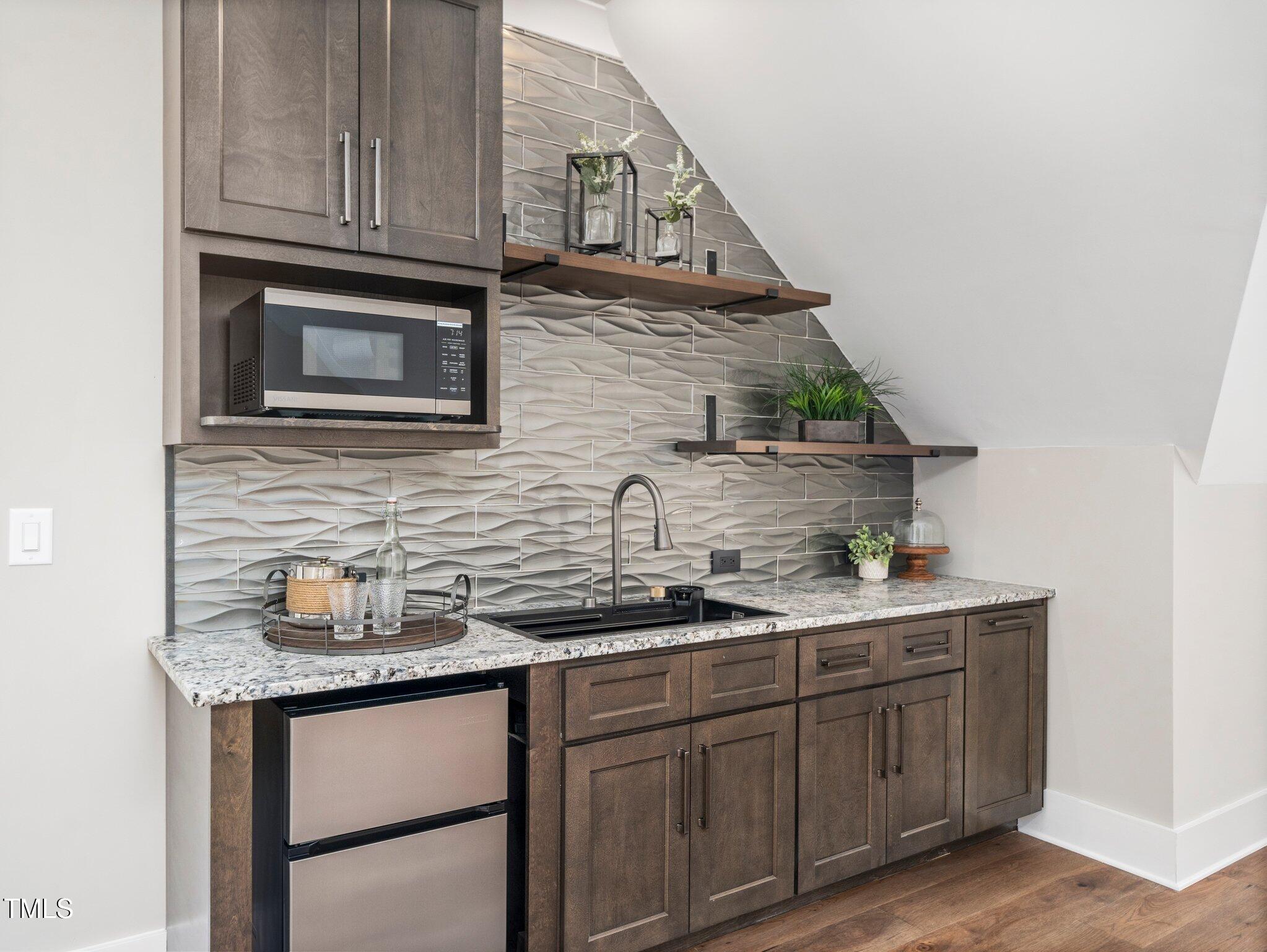 145 Wiggins Road Louisburg, NC 27549 - Photo 67 of 80 Great room kitchenette