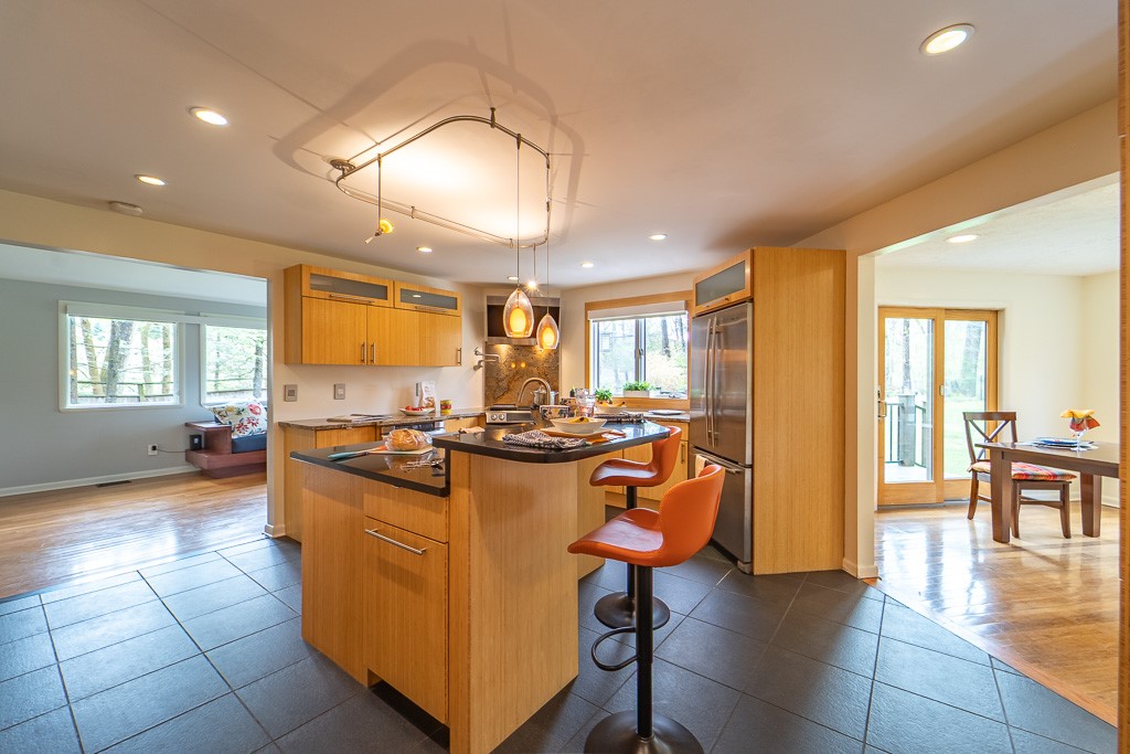 182 Park Road Perinton, NY 14534 - Photo 14 of 50 The sleek, thoughtfully designed modern kitchen is