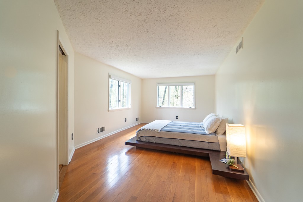 182 Park Road Perinton, NY 14534 - Photo 32 of 50 The primary suite is a true retreat, featuring har