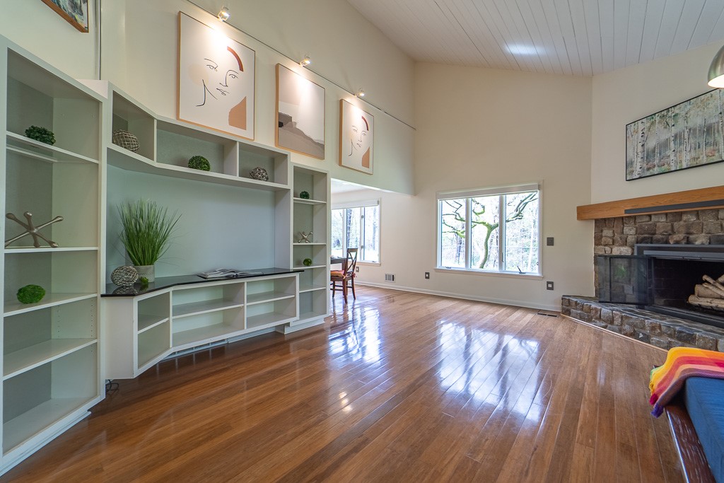 182 Park Road Perinton, NY 14534 - Photo 9 of 50 Loads of built-ins frame the room.