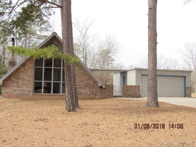 1045 Garnette Road Lancaster, SC 29720 - Photo 1 of 24 a view of a house with a snow in the yard
