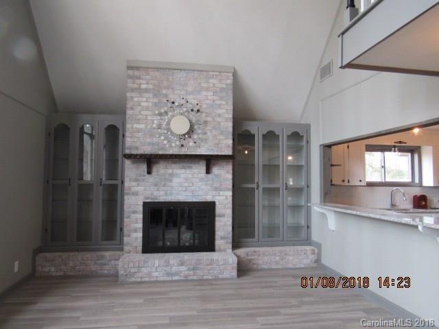 1045 Garnette Road Lancaster, SC 29720 - Photo 2 of 24 a living room with furniture and a fireplace