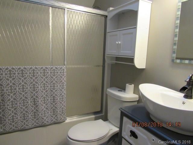 1045 Garnette Road Lancaster, SC 29720 - Photo 12 of 24 a bathroom with a toilet and a sink