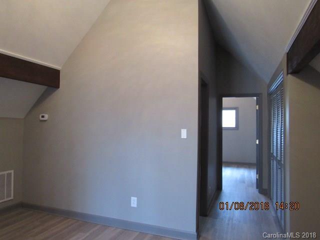 1045 Garnette Road Lancaster, SC 29720 - Photo 13 of 24 a view of a hallway with wooden floor