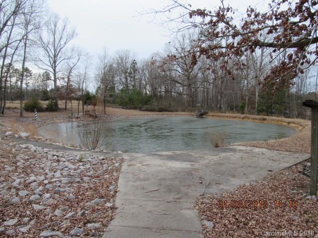 1045 Garnette Road Lancaster, SC 29720 - Photo 18 of 24 a view of a yard with large trees