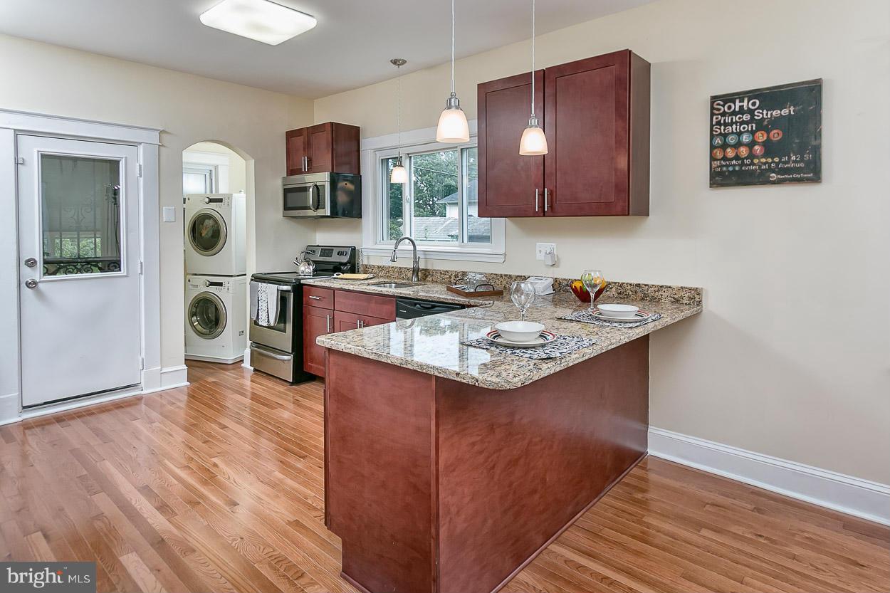 3613 Edgewood Road Baltimore, MD 21215 - Photo 11 of 30 Breakfast Bar with Pendant Lights!