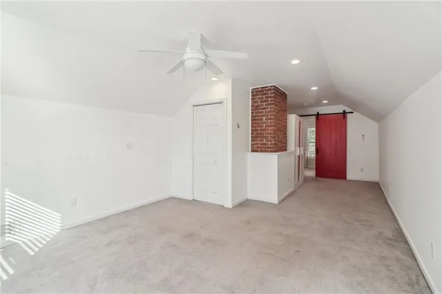 a bathroom with a shower sink and mirror