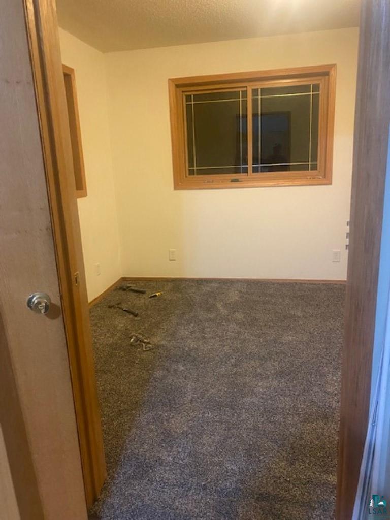 3932 Hicken Road Duluth, MN 55803 - Photo 35 of 37 New carpet in bedrooms during listing
