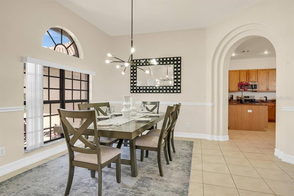 24017 Peppercorn Road Punta Gorda, FL 33955 - Photo 12 of 38 a view of a dining room with furniture