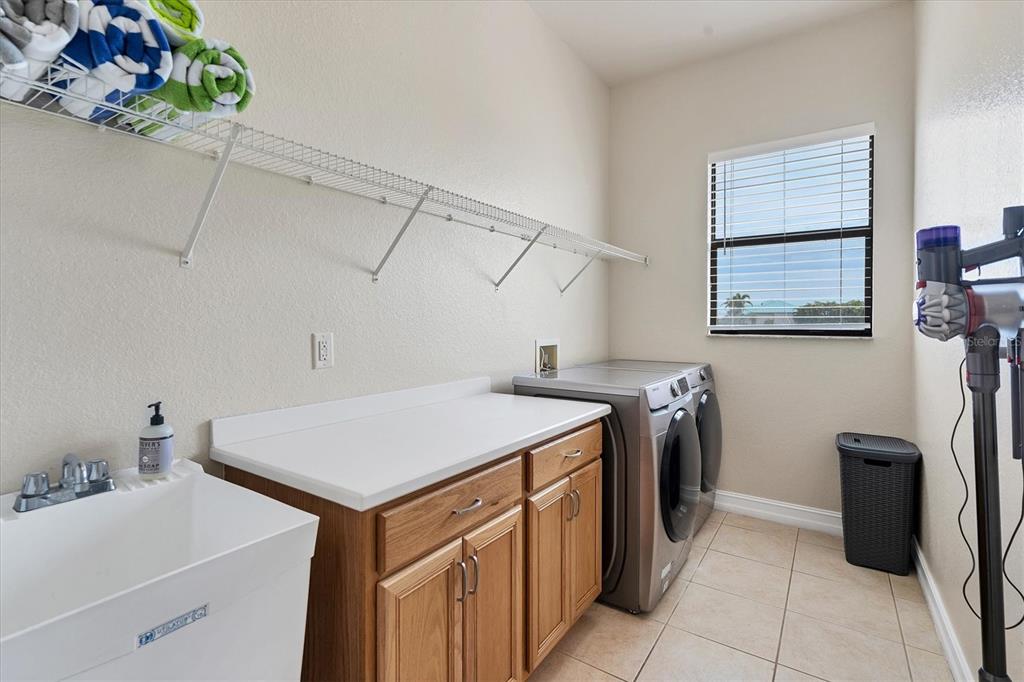 24017 Peppercorn Road Punta Gorda, FL 33955 - Photo 25 of 38 a utility room with dryer and washer