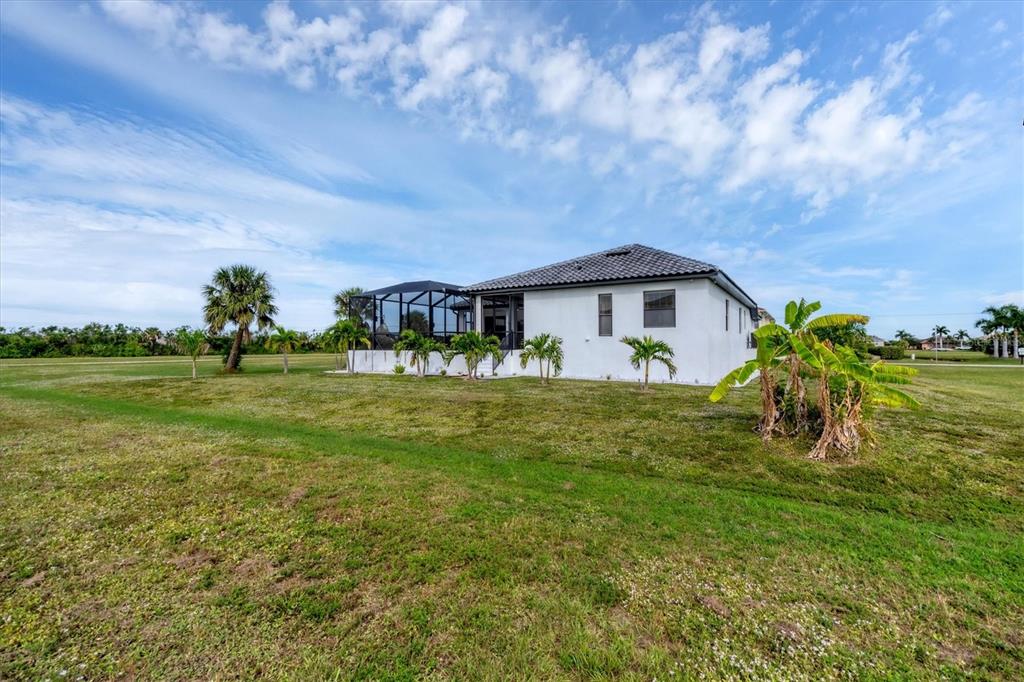 24017 Peppercorn Road Punta Gorda, FL 33955 - Photo 38 of 38 a front view of a house with garden