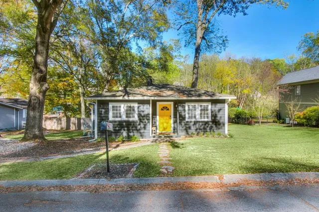 a view of a house with a swimming pool