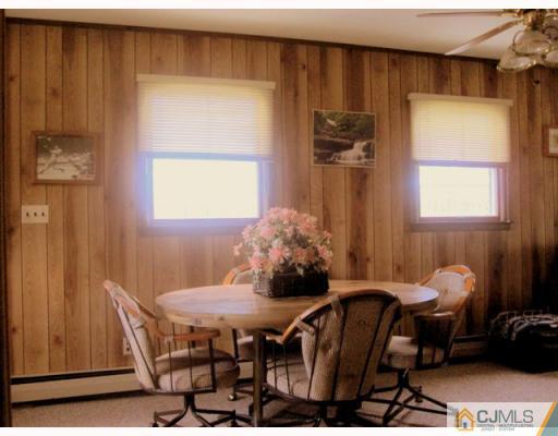 9 Matson Road Edison, NJ 08817 - Photo 4 of 10 a dining room with furniture and window