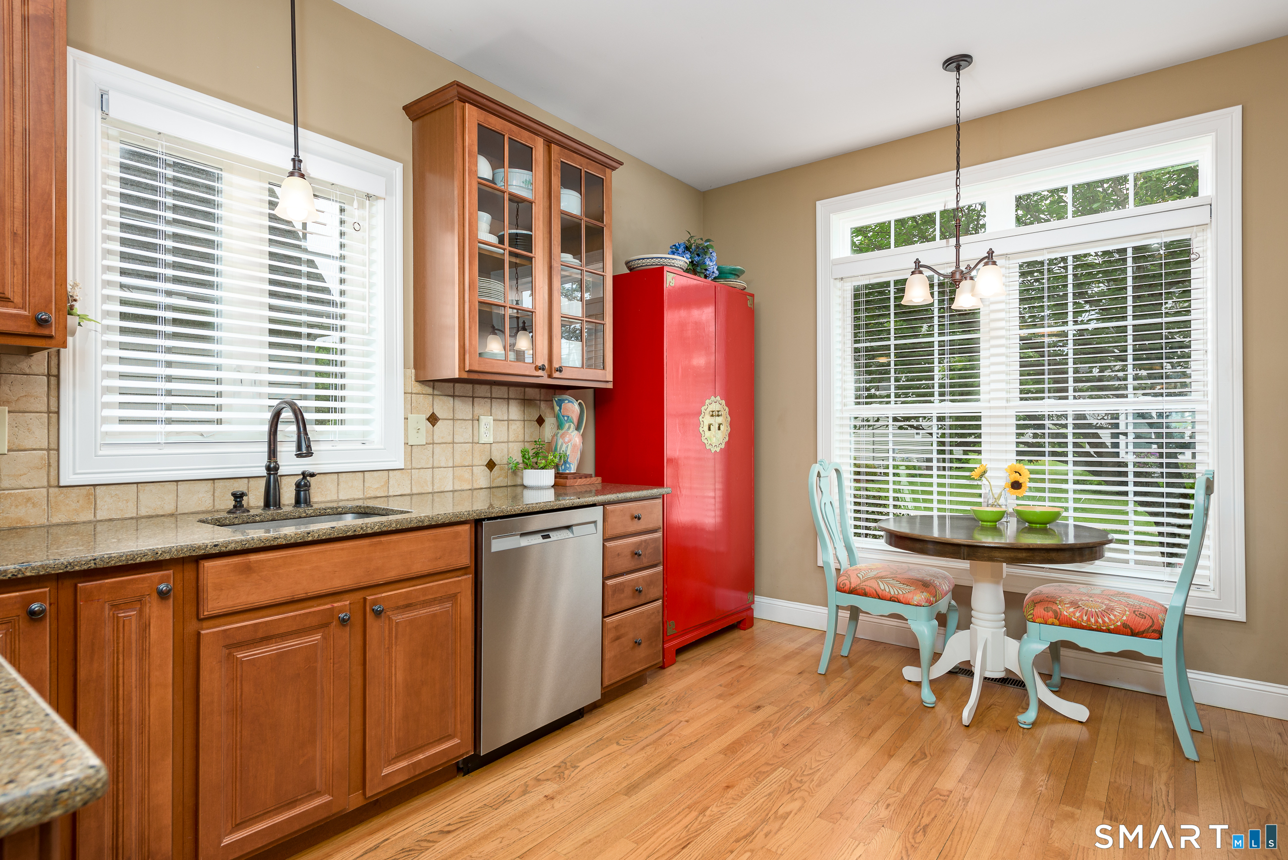 8 Greendale Drive, Unit 8 Suffield, CT 06078 - Photo 22 of 40 a kitchen with a sink stove and cabinets