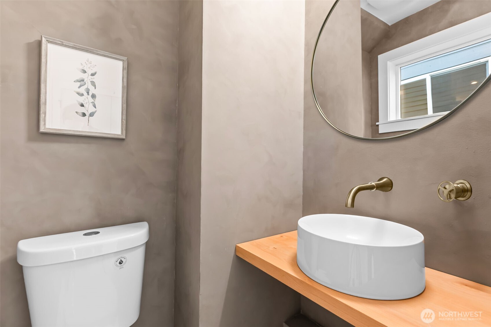 7350 22nd Avenue Northwest, Unit B Seattle, WA 98117 - Photo 11 of 24 a bathroom with a toilet and a mirror