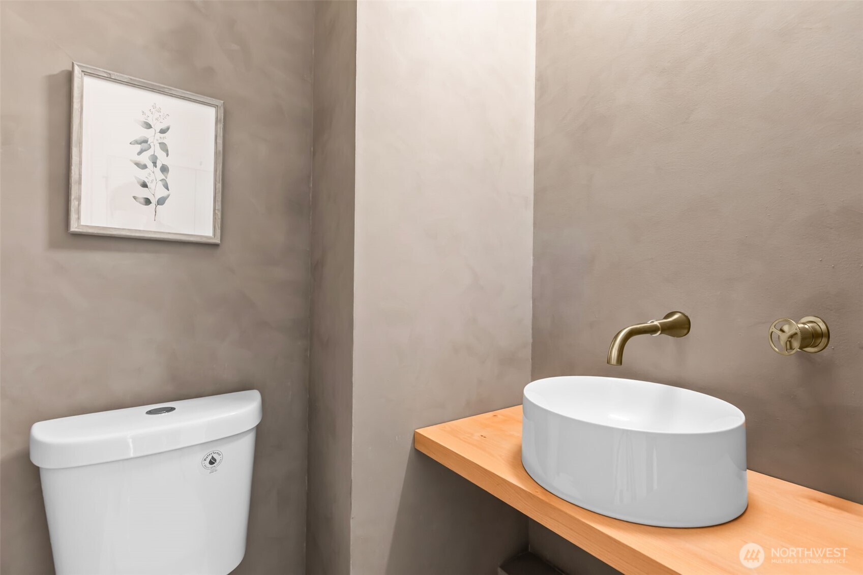 7350 22nd Avenue Northwest, Unit B Seattle, WA 98117 - Photo 22 of 24 a bathroom with a toilet and a sink