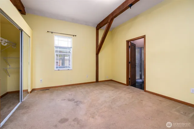 an empty room with windows