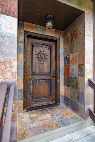 a view of fireplace and front door