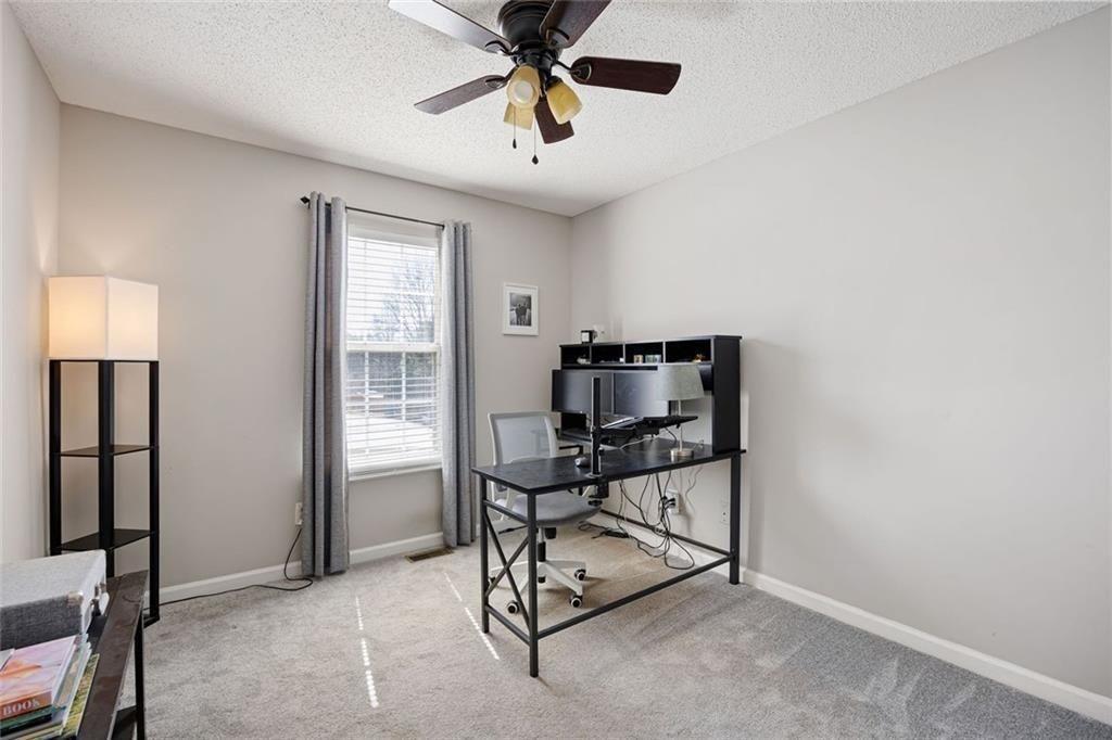 140 Mt Tabor Court Dallas, GA 30157 - Photo 17 of 32 a view of workspace with windows