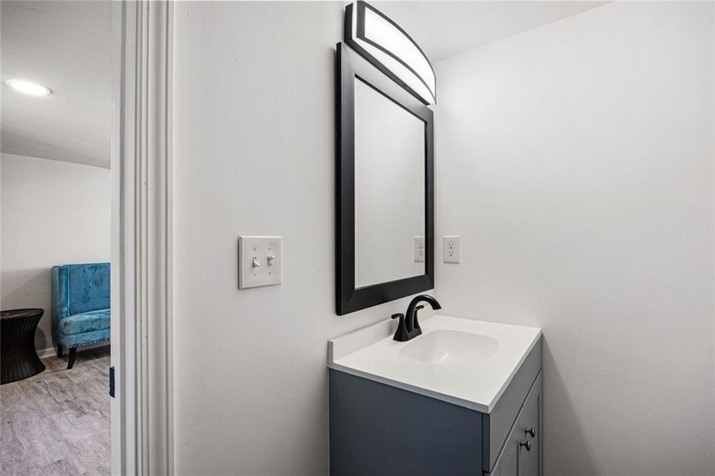 140 Mt Tabor Court Dallas, GA 30157 - Photo 25 of 32 a bathroom with a sink and a mirror