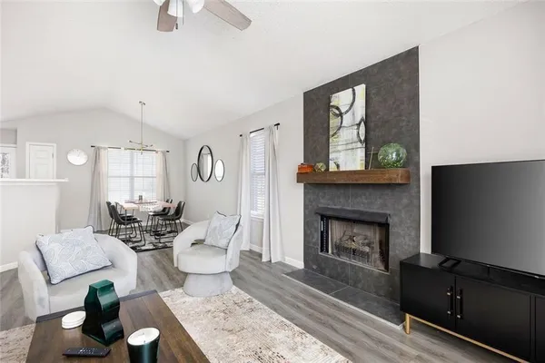 a kitchen with stainless steel appliances granite countertop a stove and a refrigerator