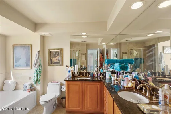 a very nice looking room with a large window and furniture