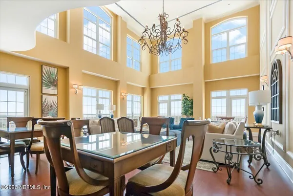 a kitchen with a counter top a stove and cabinets