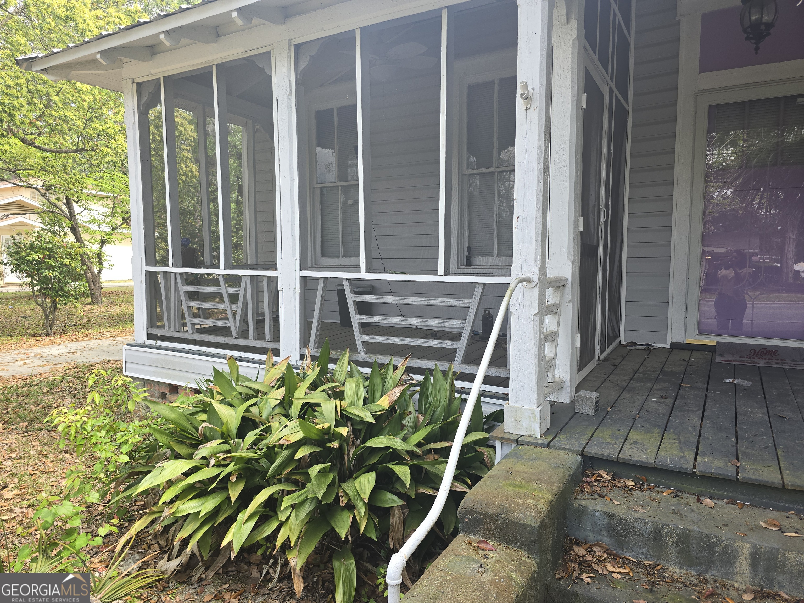 1500 Clough Street Waycross, GA 31501 - Photo 3 of 12 a backyard of a house with seating space