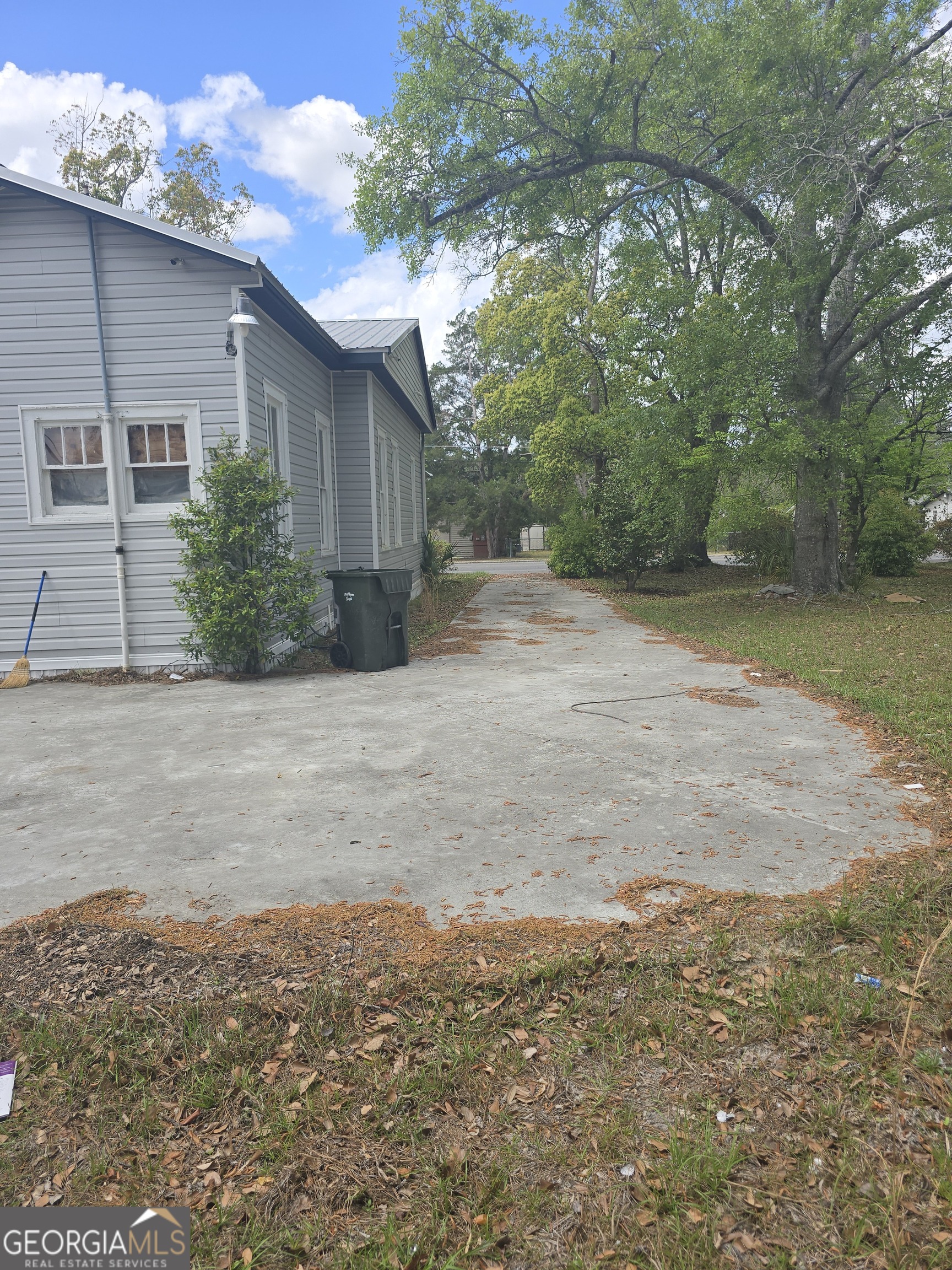 1500 Clough Street Waycross, GA 31501 - Photo 6 of 12 a view of a house with a yard