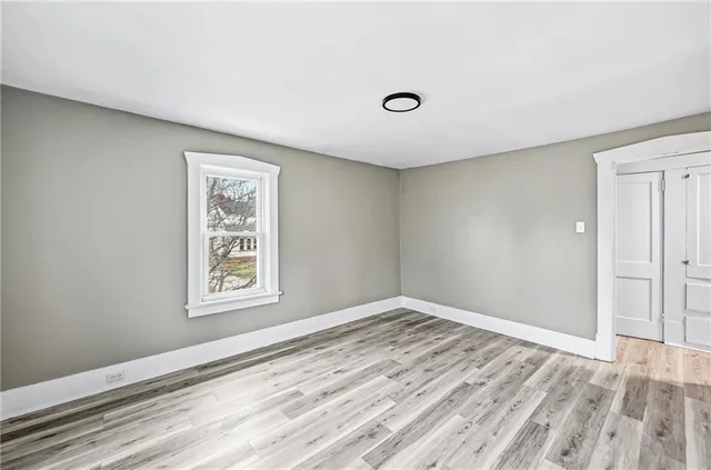 a view of a livingroom with wooden floor