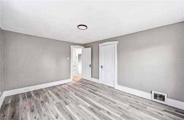 a bathroom with a bathtub and a toilet