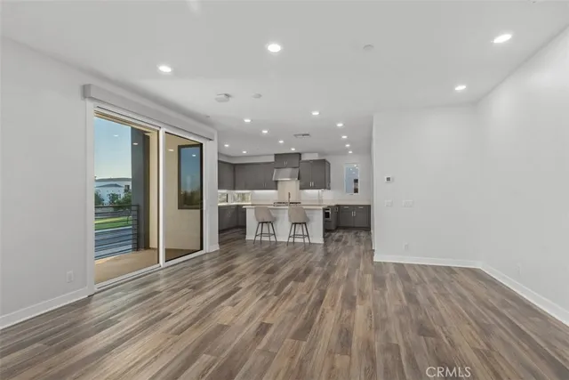a living room with a wooden floor