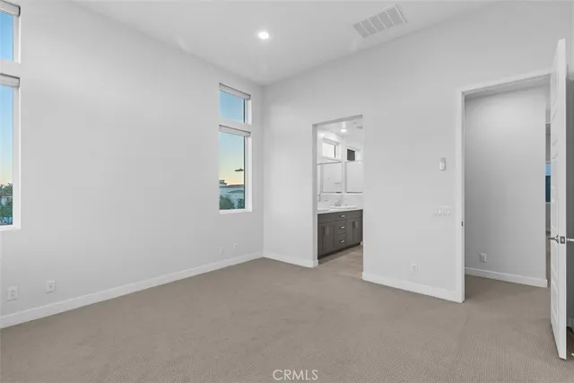 an empty room with a bathroom