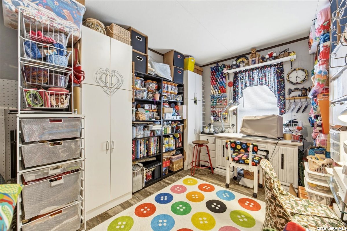 101 Rocky Ridge Drive Poteet, TX 78065 - Photo 23 of 36 a view of walk in closet with clothes and shoes