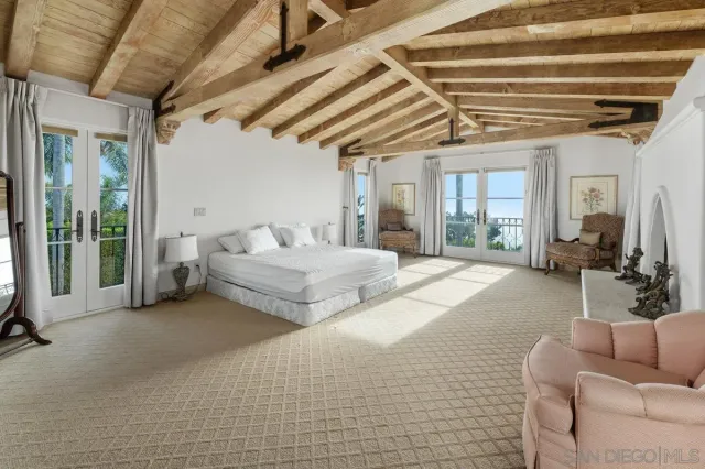 a bedroom with furniture