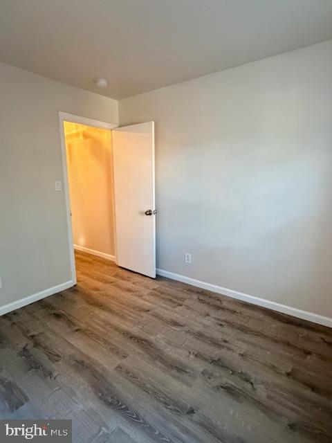9203 Hood Road Manassas, VA 20110 - Photo 14 of 23 an empty room with wooden floor and windows