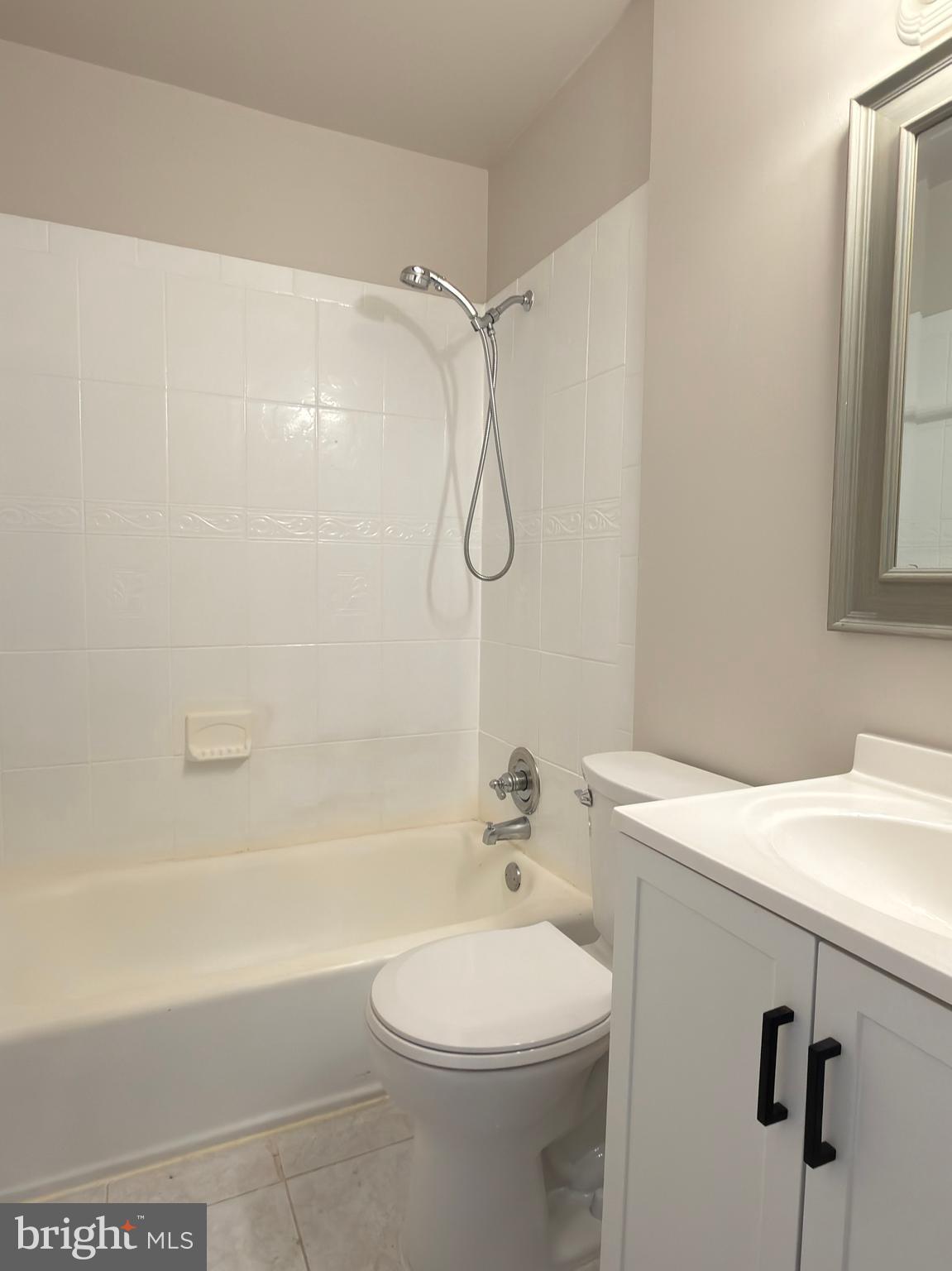 9203 Hood Road Manassas, VA 20110 - Photo 17 of 23 a bathroom with a sink a toilet and shower