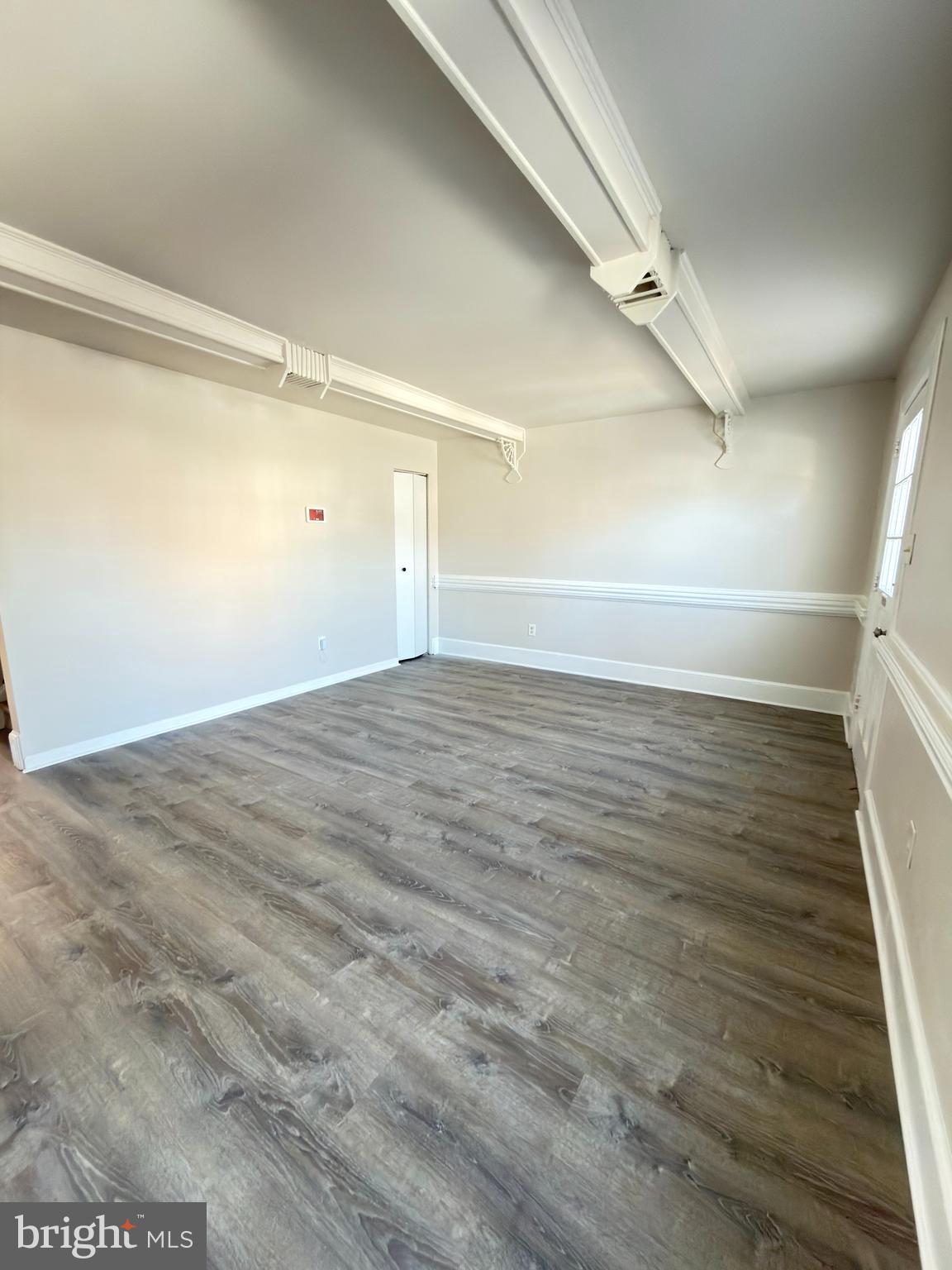 9203 Hood Road Manassas, VA 20110 - Photo 4 of 23 en empty room with wooden floor