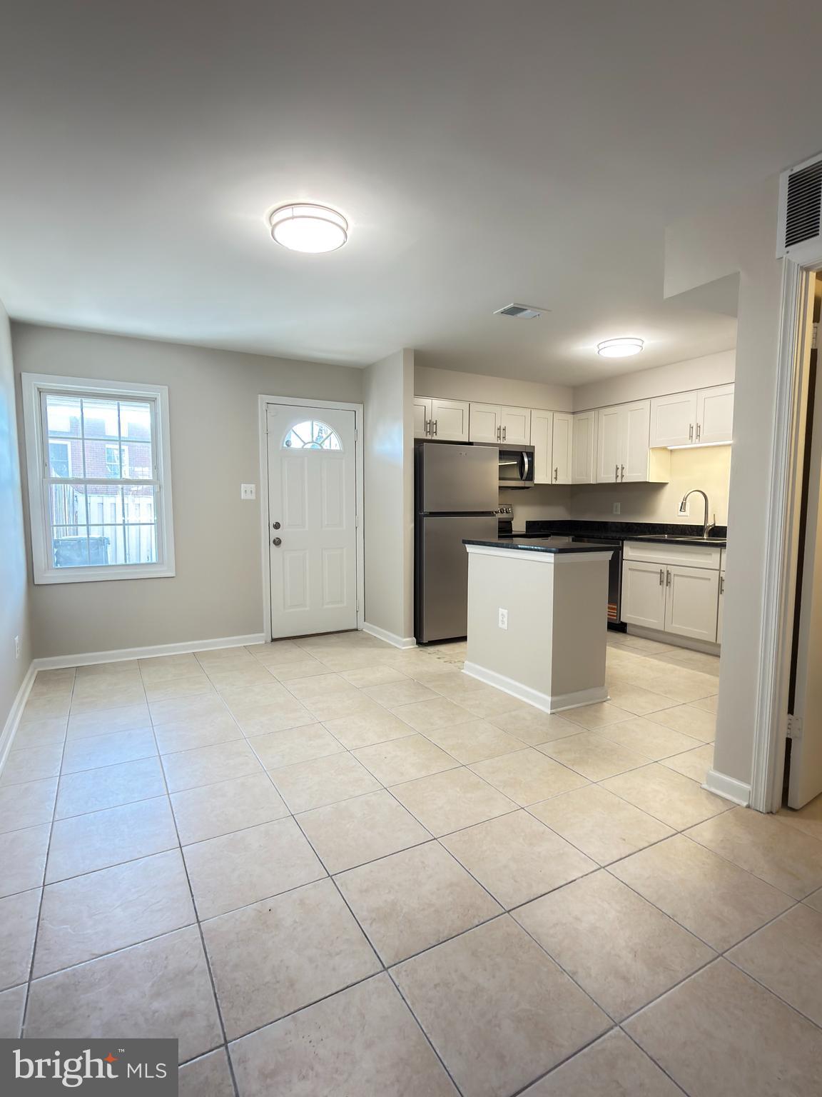 9203 Hood Road Manassas, VA 20110 - Photo 5 of 23 a view of kitchen with windows