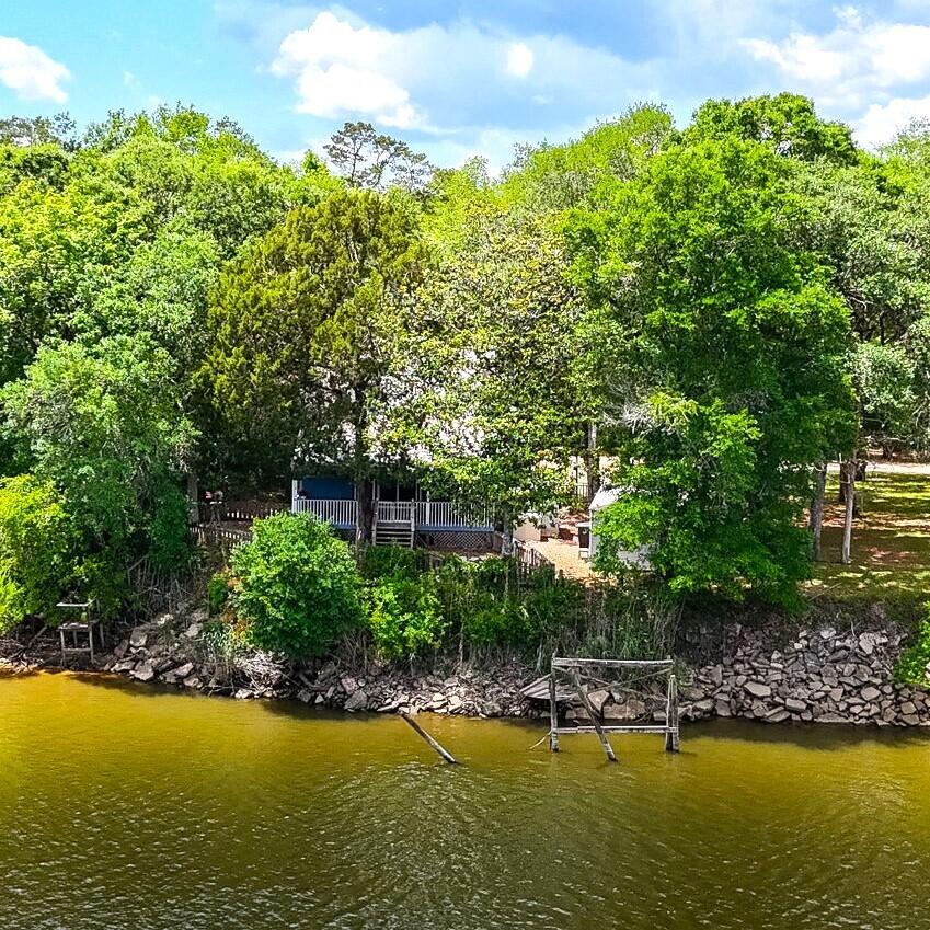 a view of a swimming pool with an outdoor space and seating area